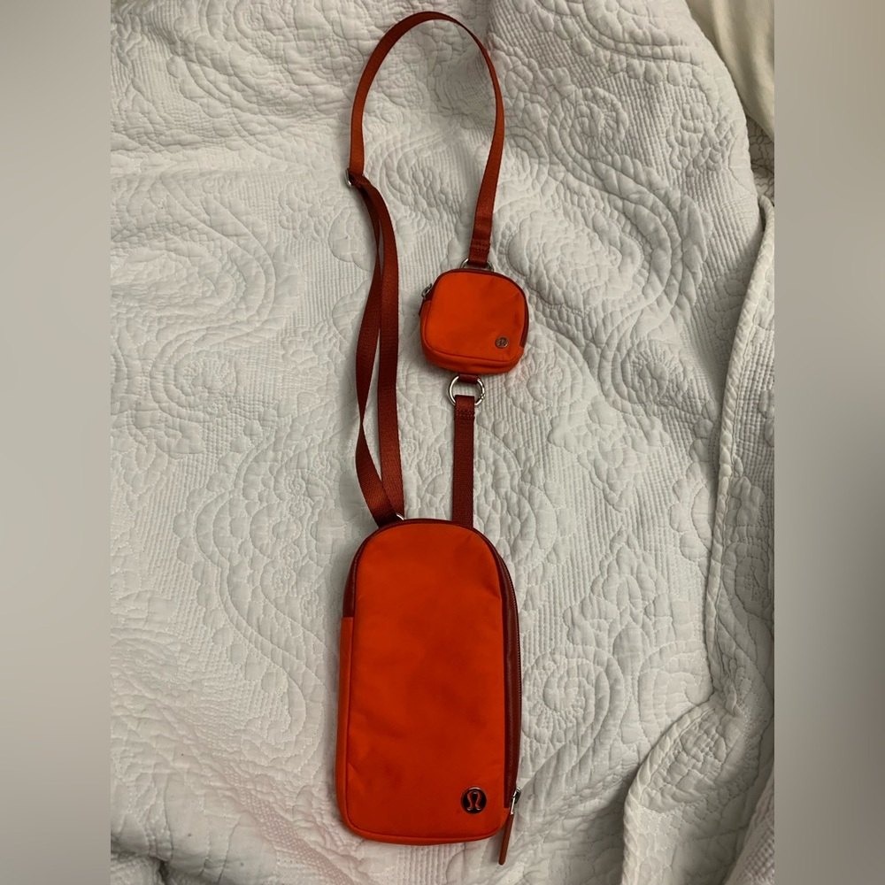 LuluLemon cross body bag and ear bug holder